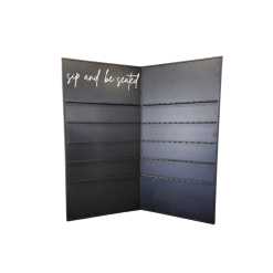 Black two panel champagne wall with write script on the left top