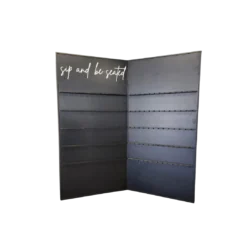 Black two panel champagne wall with write script on the left top