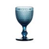 Textured glass goblet in navy blue with stem and round base.