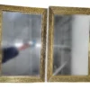 set of two rectangular mirrored trays. Thick gold trim.