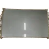 Rectangle mirrored tray with gold trim.