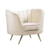 Cream, velvet chair with gold metal legs.