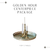 Centerpiece package includes brass candlesticks and mirrored tray
