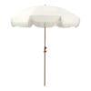 cream colored umbrella with tassles.
