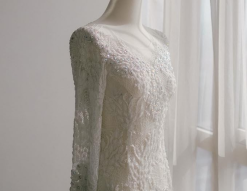 White dress form with dress.