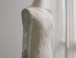 White dress form with dress.