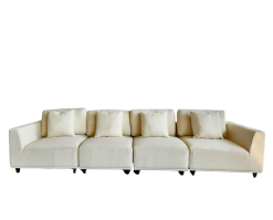 Kanissu Sofa for rent at Violet Vintage Indianapolis: A versatile 4-seat modular sofa in cream bouclé fabric with black legs, showing how you can rent one or both to create a large 8-seater curved lounge for events