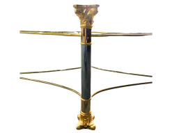 Shagri Coffee Table for rent at Violet Vintage Indianapolis: A Regency-style oval glass coffee table featuring a beveled edge and an ornate mixed-metal base with gold-finished carved capitals, silver pillars, and gold-sculpted feet.