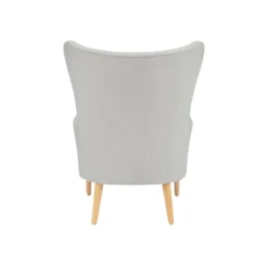 Back view of Clara wingback lounge chair with curved wings and tapered wood legs