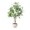 Faux Ficus tree in white pot.