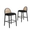 Pair of Marlowe rattan event bar stools with black wood frames and natural woven cane backs, available for rental in Indianapolis