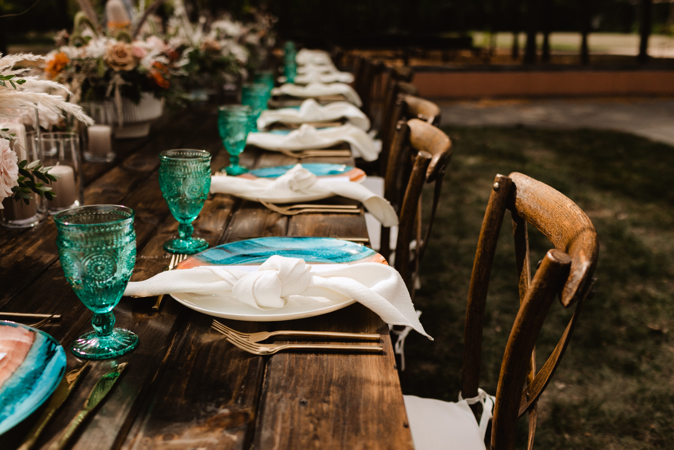 Teal vintage goblets set on a wedding reception table in Indianapolis