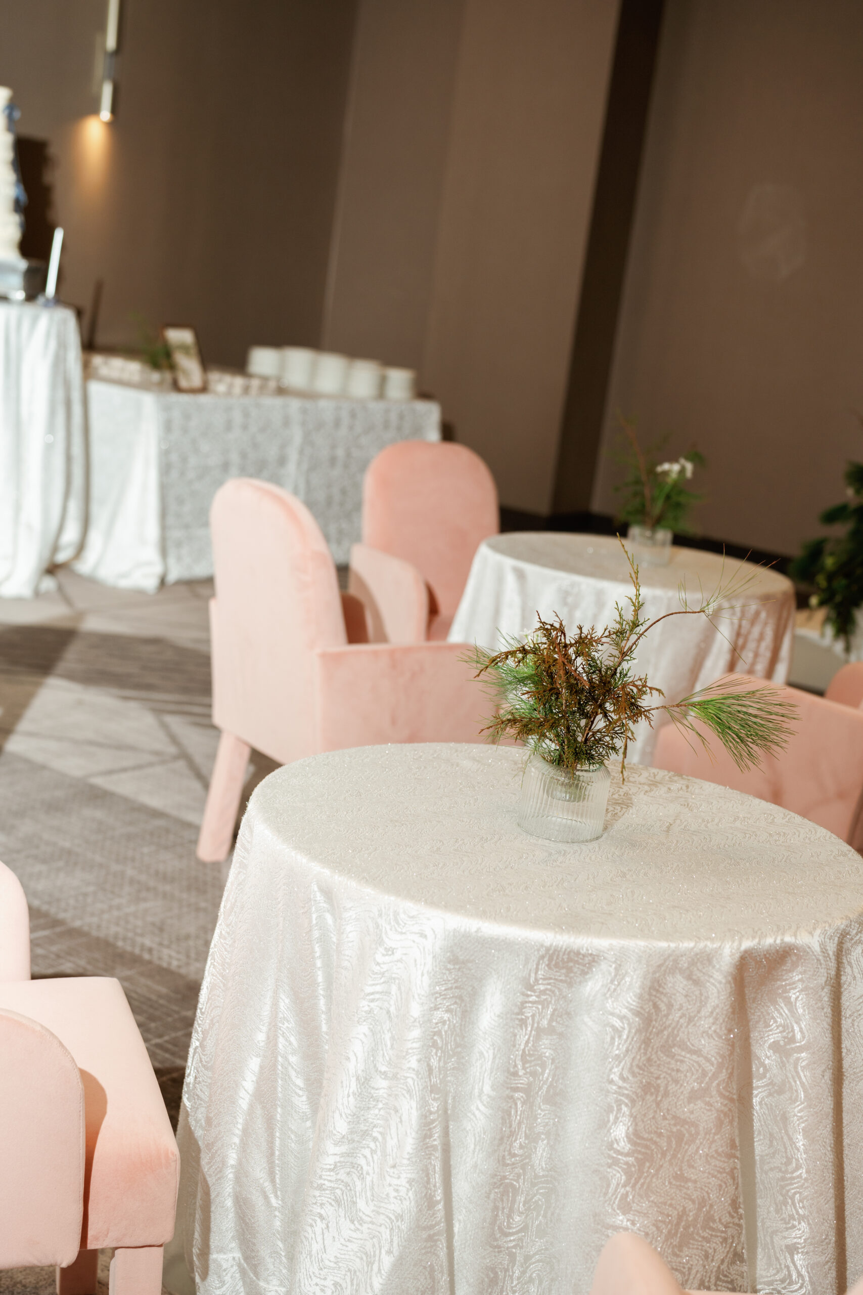 Blush Siena Chairs arranged around cocktail-height guest tables in the InterContinental Indianapolis ballroom