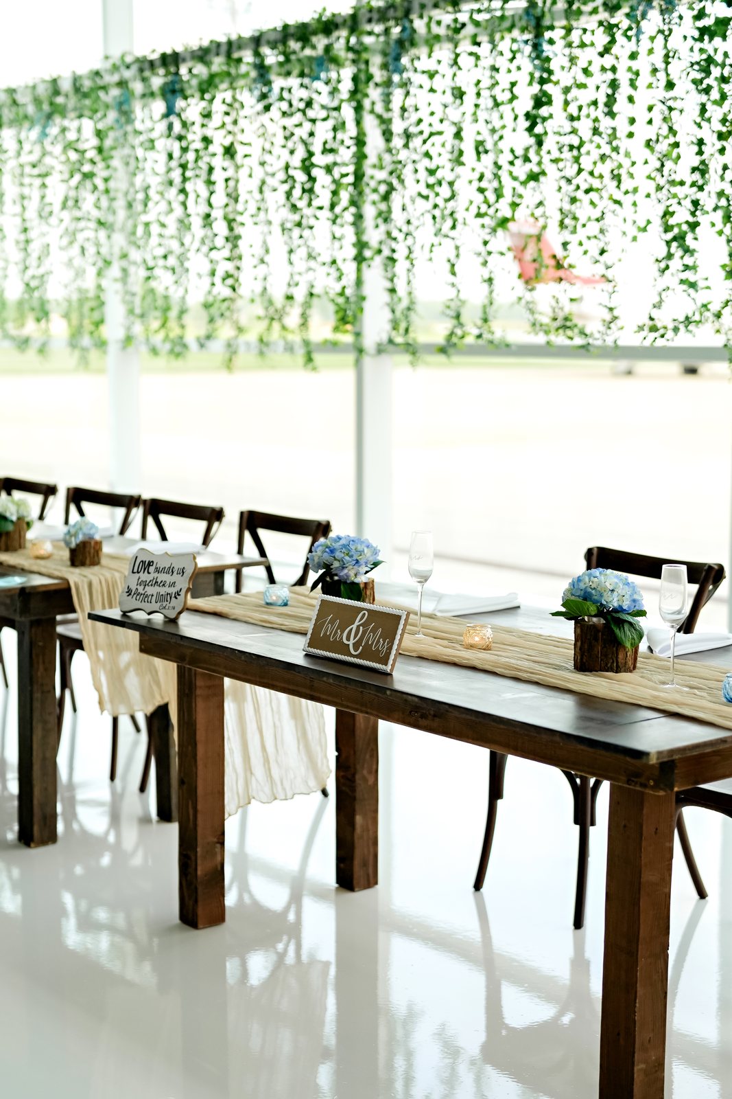 Kingston Sweetheart Farmtable styled for the couple's table at a Beck's Hangar wedding in Zionsville.