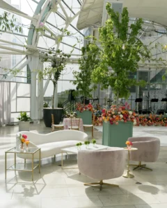Pastel cocktail hour lounge with an Avalon Sofa and Rosé Swivel Chairs at the Indianapolis Artsgarden