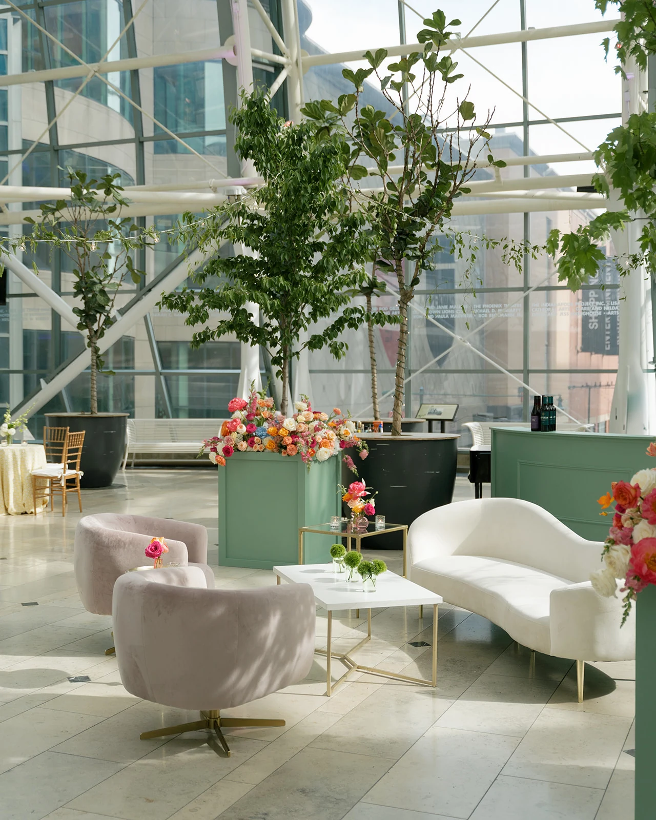 Rosé Swivel Chairs with an Avalon Sofa and Walker Coffee Table at the Indianapolis Artsgarden